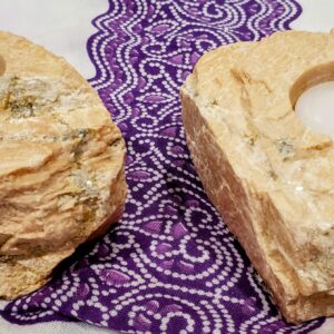 Natural Stone Candle Holders Set, accents of golden pyrite veins within the shades of pink sandstone.