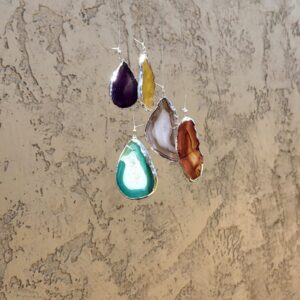 Windchime of bright chakra colored Agate Slices, crowned in silver.