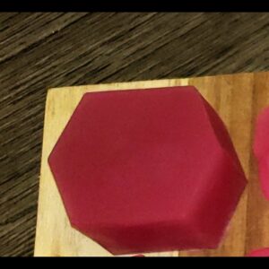 Homemade Soap, opaque hexagon, rose colored.
