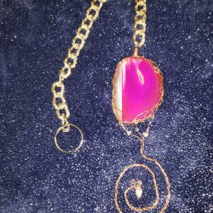Suncatcher of Pink Agate, copper metallic wrapped.