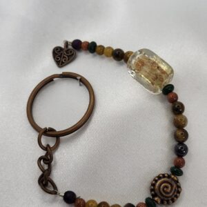 Bronze heart with glass & semi precious gemstones, key chains; medium copper ring.